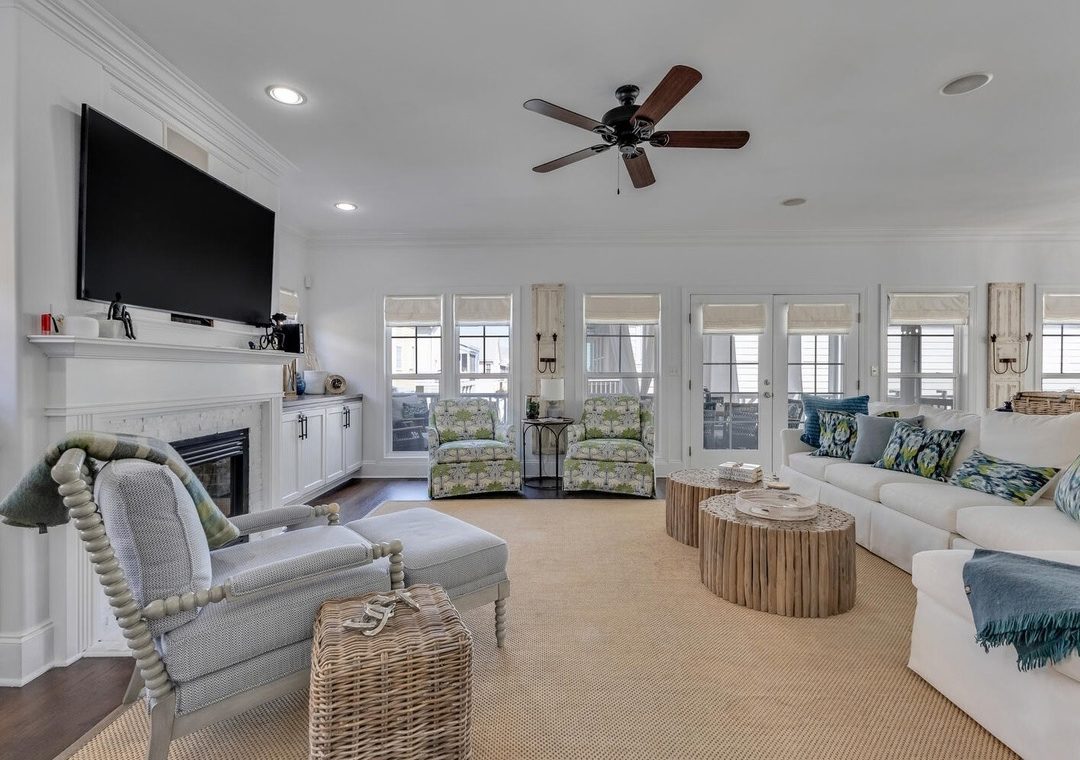 A bright living room with a white sectional